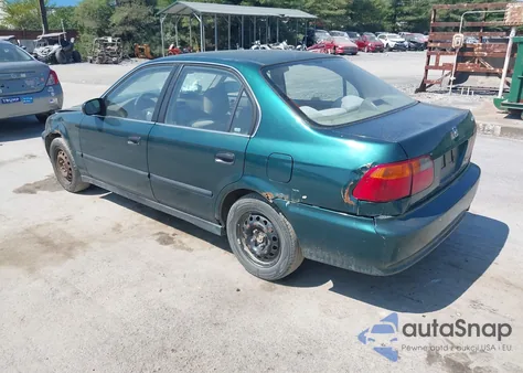1999 Honda Civic Lx z USA, uszkodzony, nr VIN 2HGEJ6670XH535122